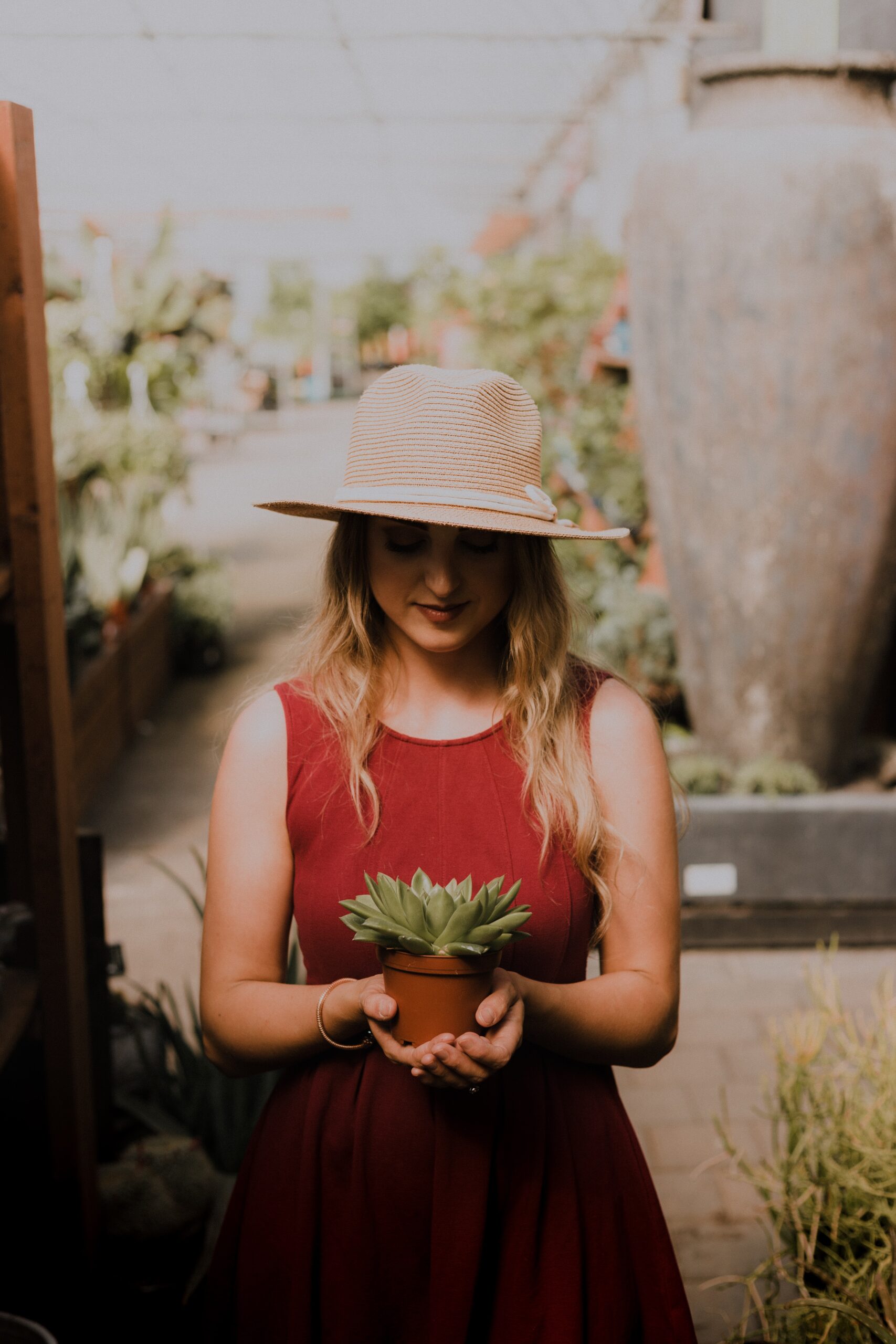 Woman holding plant